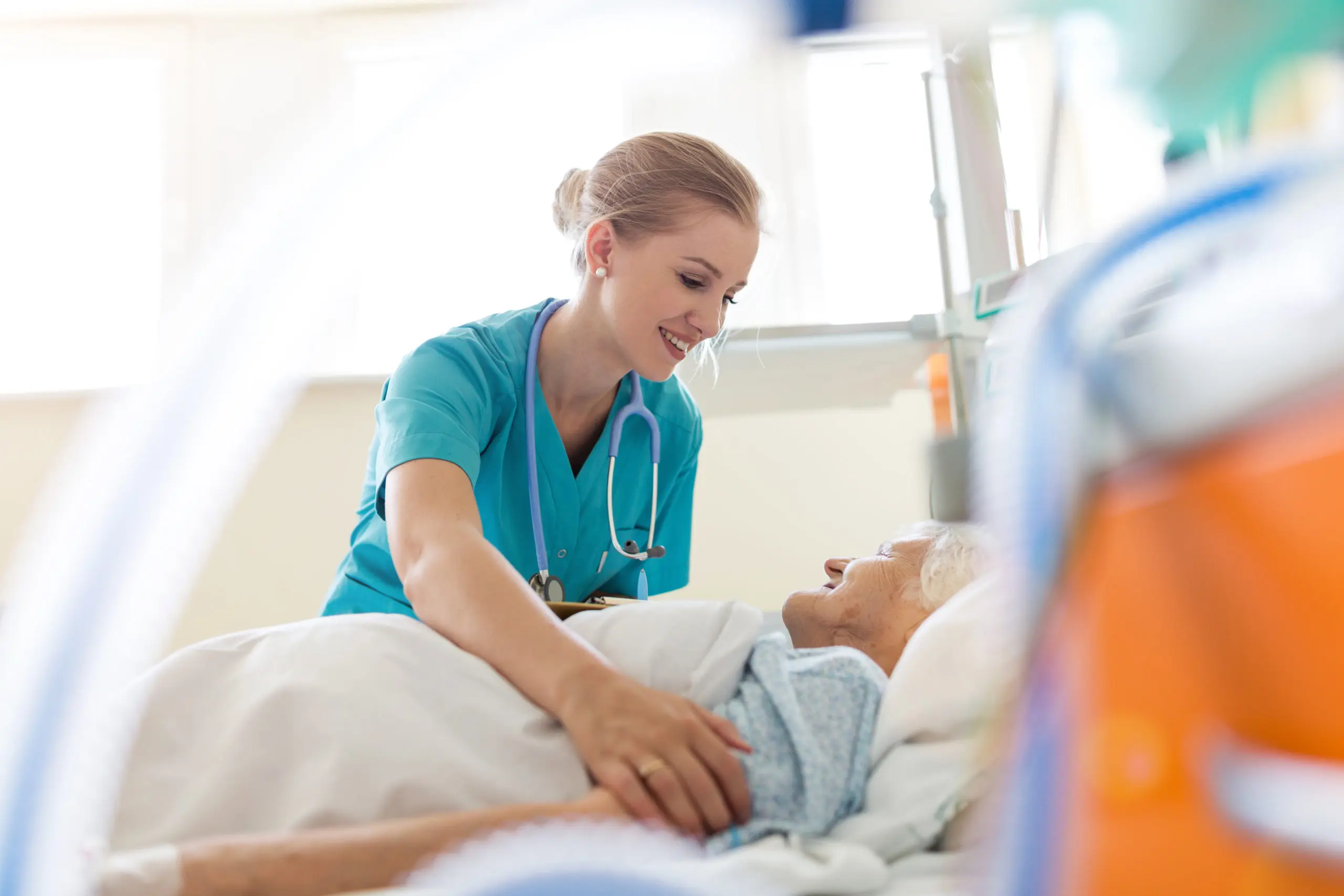 A nurse taking care of a senior patient