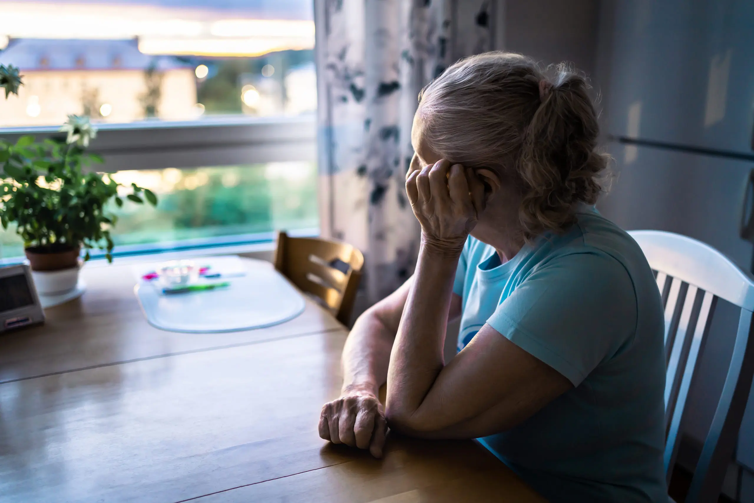 An old woman with dementia in her home