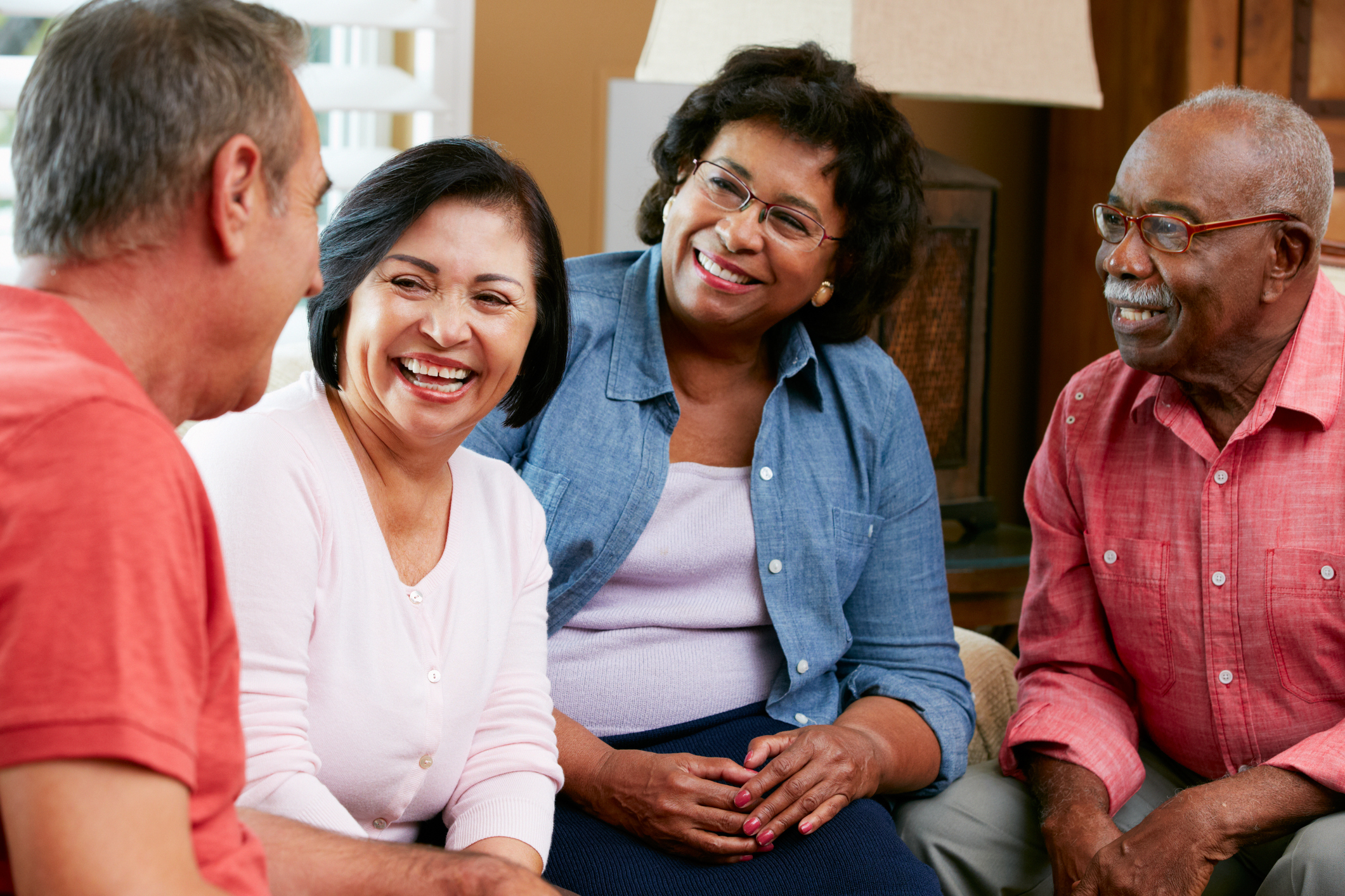 Group of senior friends talking and socializing