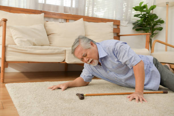 an old man on the living room floor